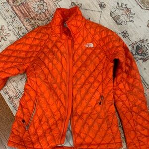 The North Face Women's Bright Orange Quilted Puffer Jacket